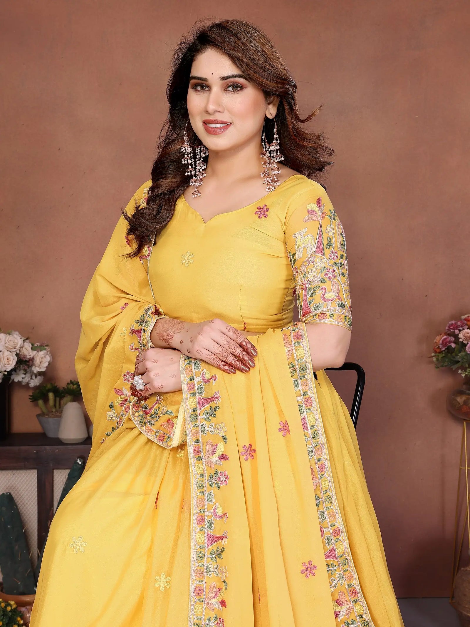 Yellow Embroidered Lehenga editorial pose with floral folk border – Kalyanja KL171
