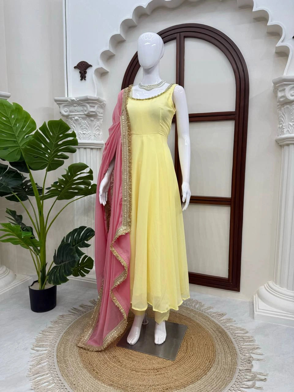 Yellow Fancy Lace Work Anarkali Suit mannequin full-length side angle – Kalyanja KU294