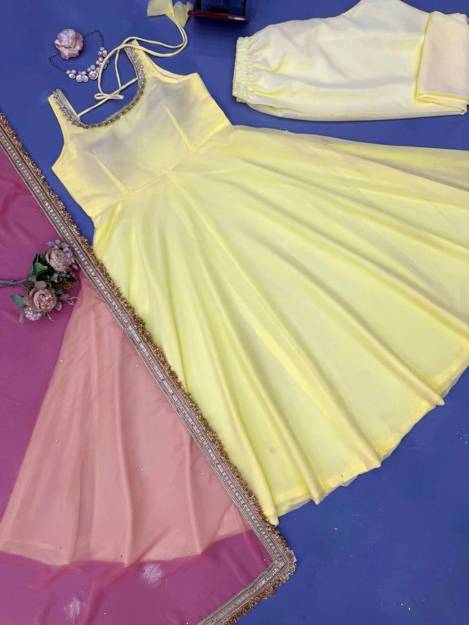 Yellow Fancy Lace Work Anarkali Suit flat lay full set with pink dupatta and pant – Kalyanja KU294