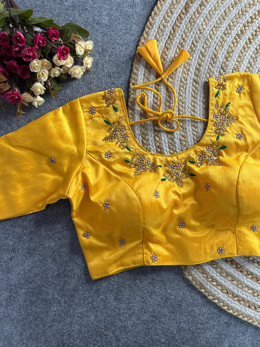Yellow floral embroidery Banglori silk blouse with intricate design, perfect for traditional and festive occasions.