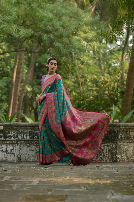 Dark turquoise Zari work soft Pashmina silk saree featuring intricate Kashmiri-inspired jal weaving pattern, perfect for festive and traditional occasions.