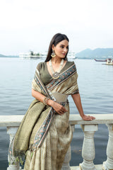Beige Zari Work soft silk saree showcasing intricate craftsmanship and elegant detailing perfect for festive and traditional occasions