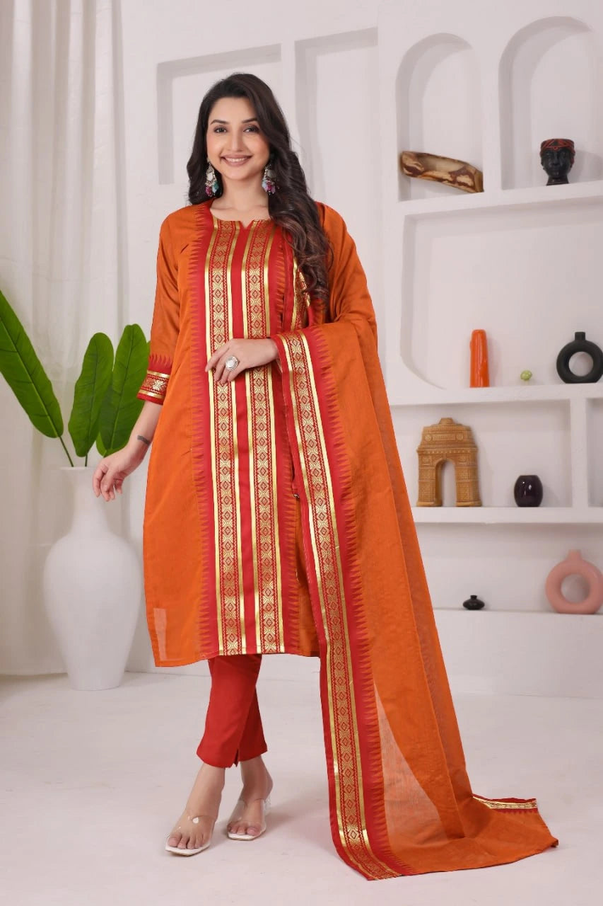 Woman wearing an orange and red traditional outfit with a white background