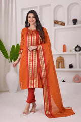 Woman wearing an orange and red traditional outfit with a white background