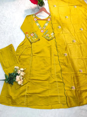 Yellow traditional outfit with floral embroidery on a white background