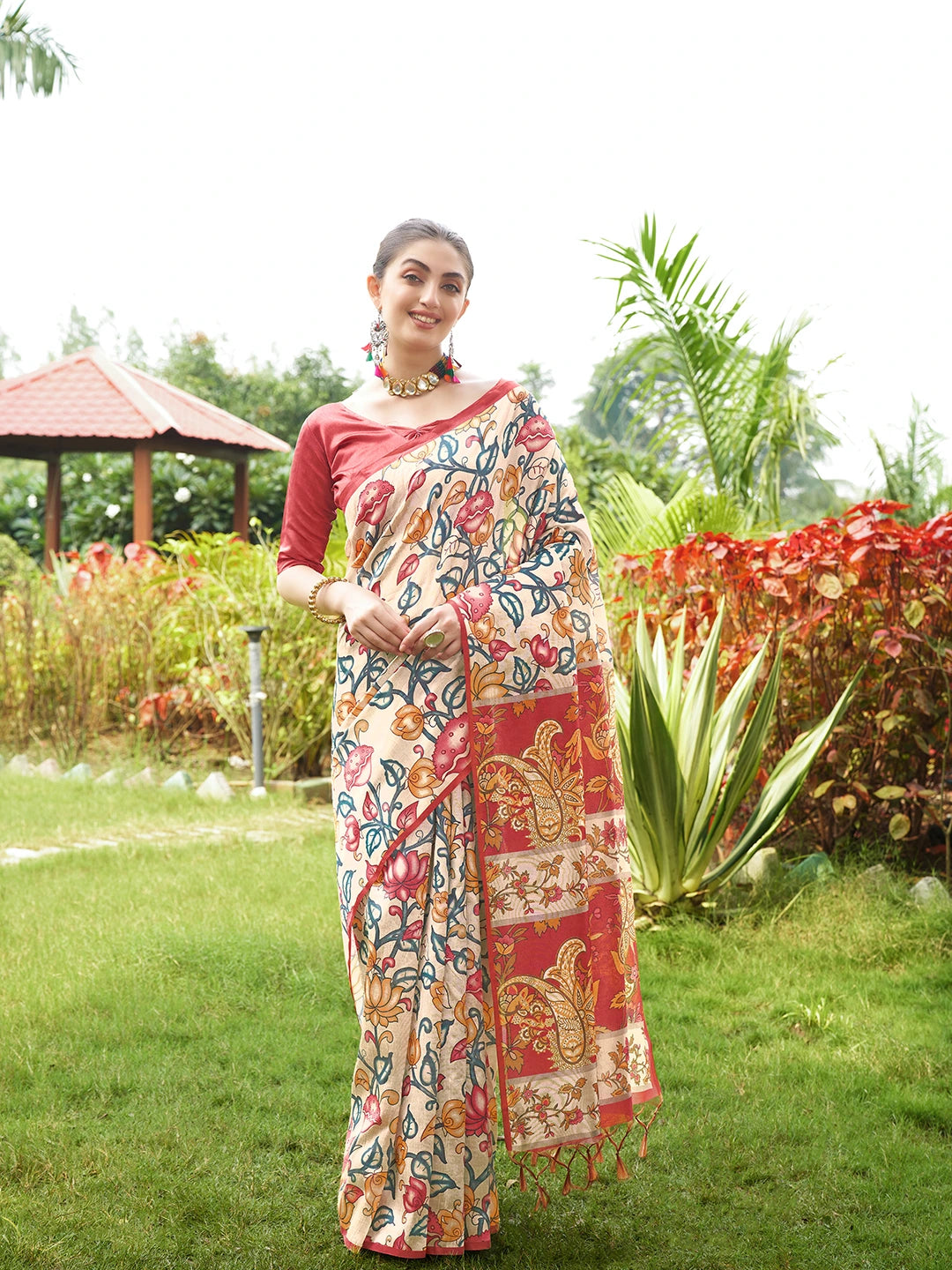 Stylish Red floral printed saree with intricate woven border and elegant traditional ethnic design