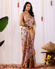 Woman wearing a patterned saree with a white curtain background