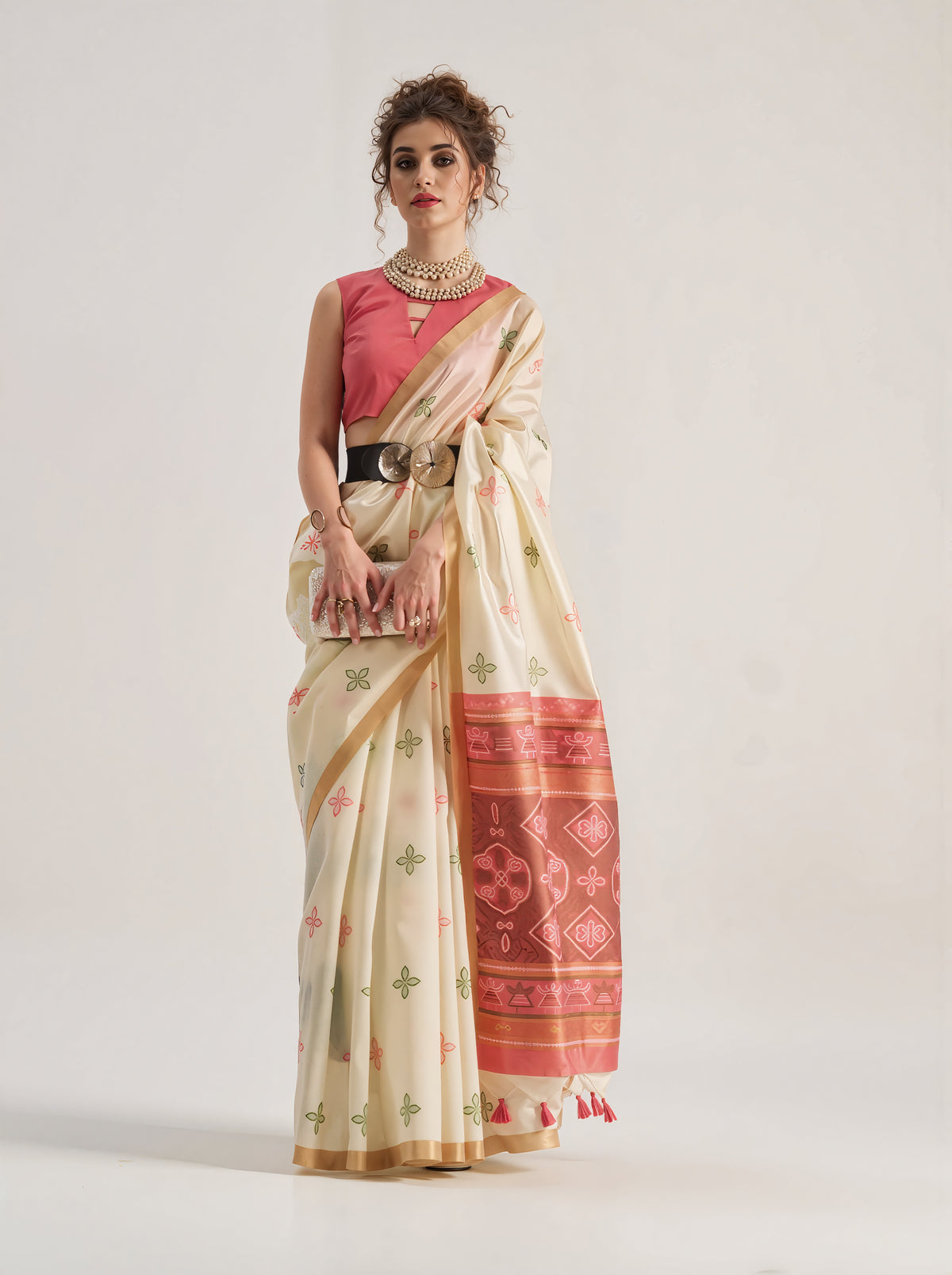 Elegant beige Patola silk saree featuring intricate geometric and floral weaving patterns. Includes a matching blouse piece. Ideal for festive and ceremonial occasions.