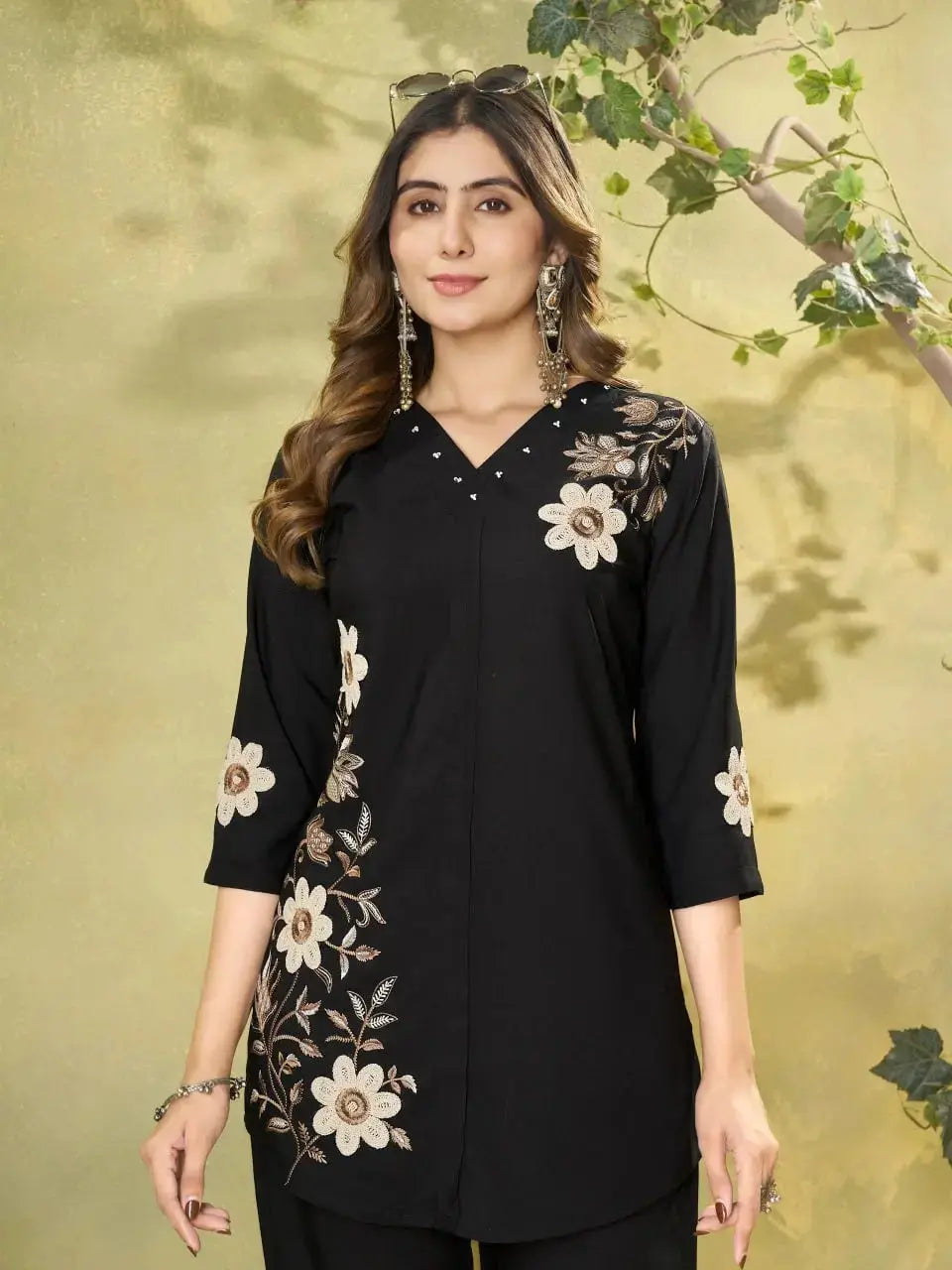 Black Coord Set with V-neck and floral embroidery closeup