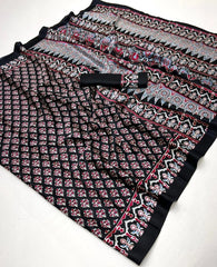 Folded fabric with intricate pattern on a white background