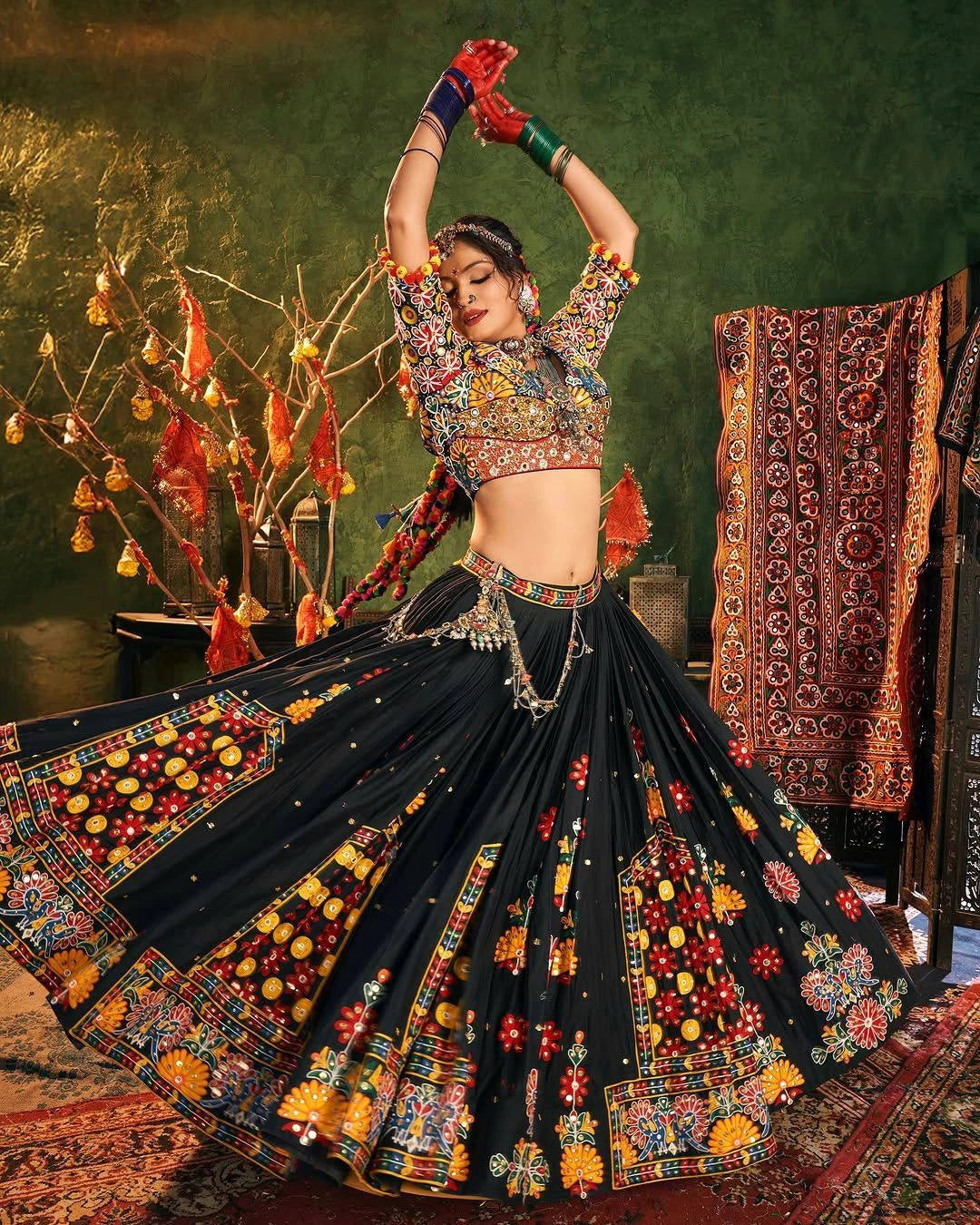 Dancer in traditional outfit with floral patterns in a decorative setting