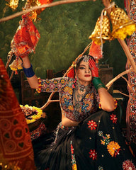 Traditional dancer in colorful attire with decorative elements