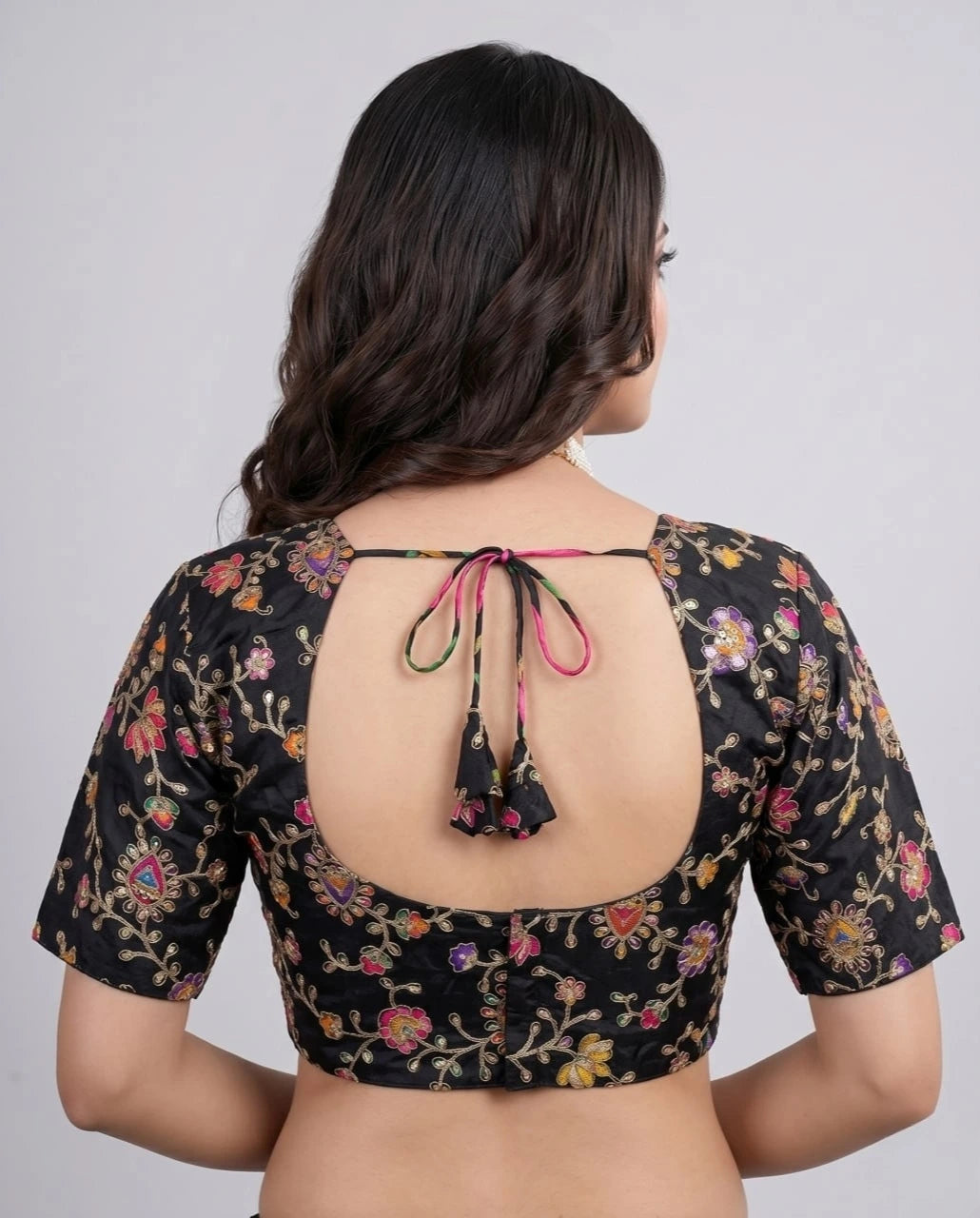 Elegant black pure viscose blouse with embroidery and printed motifs for women.