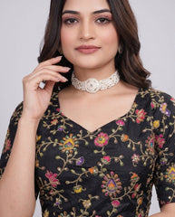 Stylish black pure viscose blouse featuring intricate embroidery and printed detailing.