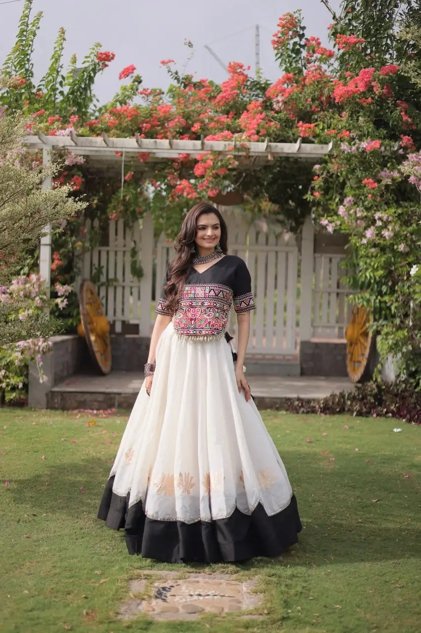 Traditional Black and White Lehenga Choli with Colorful Mirror Style Embroidery and Festive Appeal