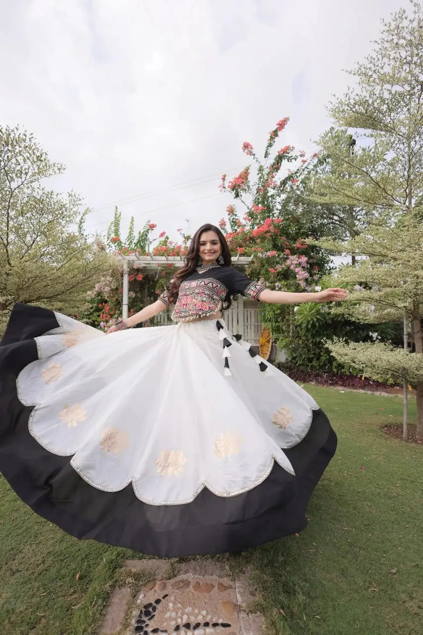 Stylish Ivory White Lehenga Choli with Colorful Handcrafted Pattern, Black Border, and Festive Wear Look