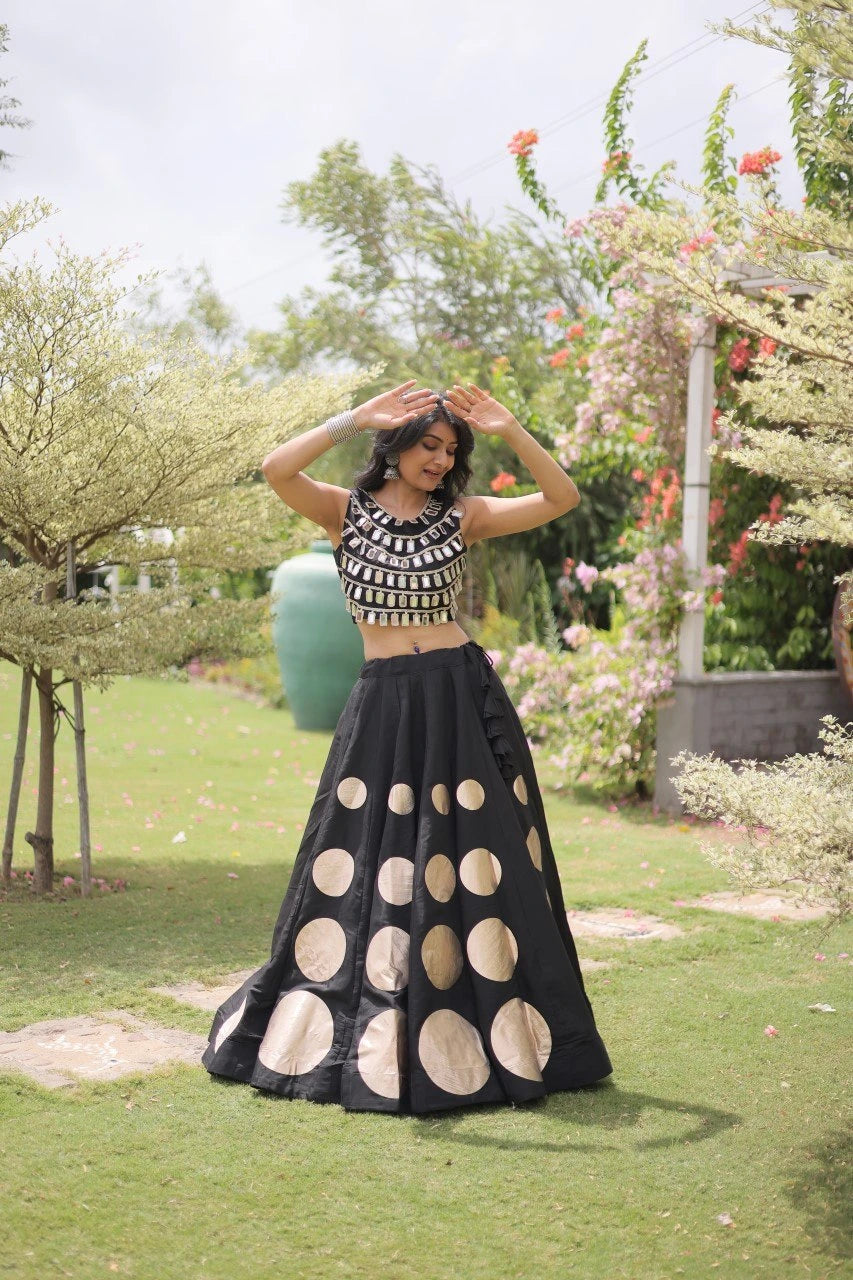 Premium black party wear lehenga designed with luxurious detailing and elegant traditional craftsmanship.