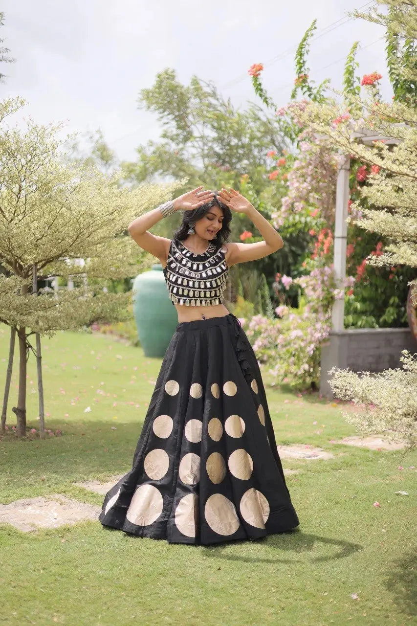 Premium black party wear lehenga designed with luxurious detailing and elegant traditional craftsmanship.