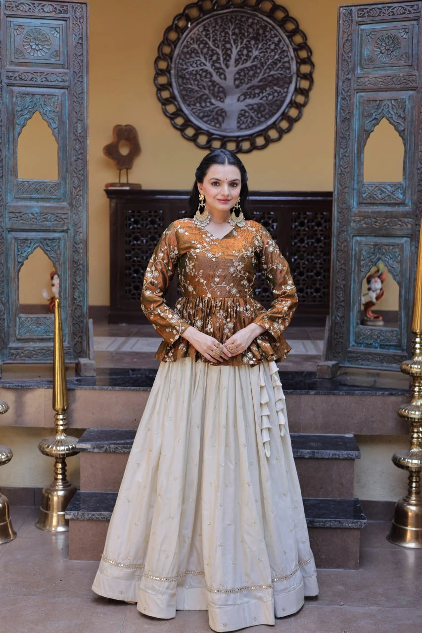 Woman in traditional outfit standing in a decorated interior setting