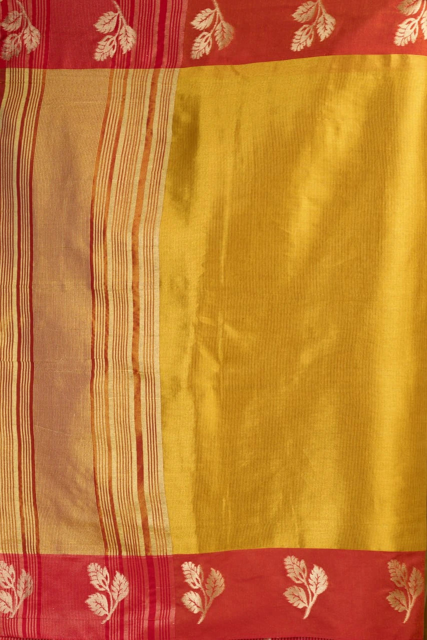 Yellow saree with red border and leaf patterns