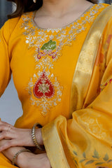 Yellow embroidered traditional outfit with gold border