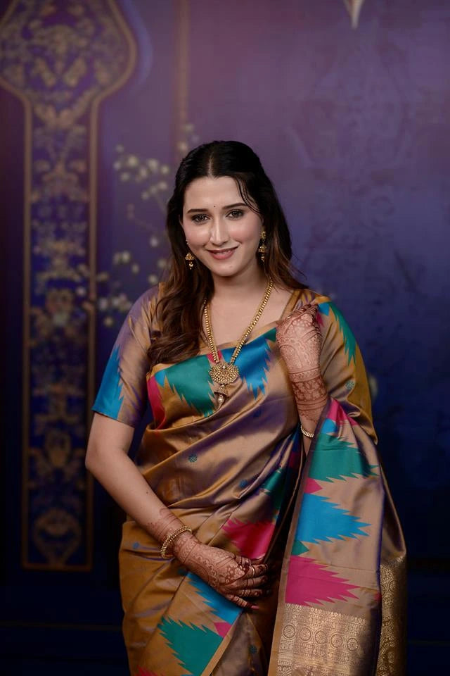 Woman in a traditional saree with a decorative background