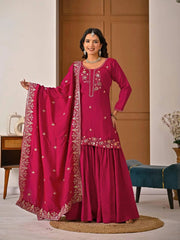 Crimson red heavy embroidered suit with shimmering sequins and threadwork accents.