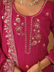 Stylish crimson red Vichitra suit with heavy embroidery on sleeves and hemline.