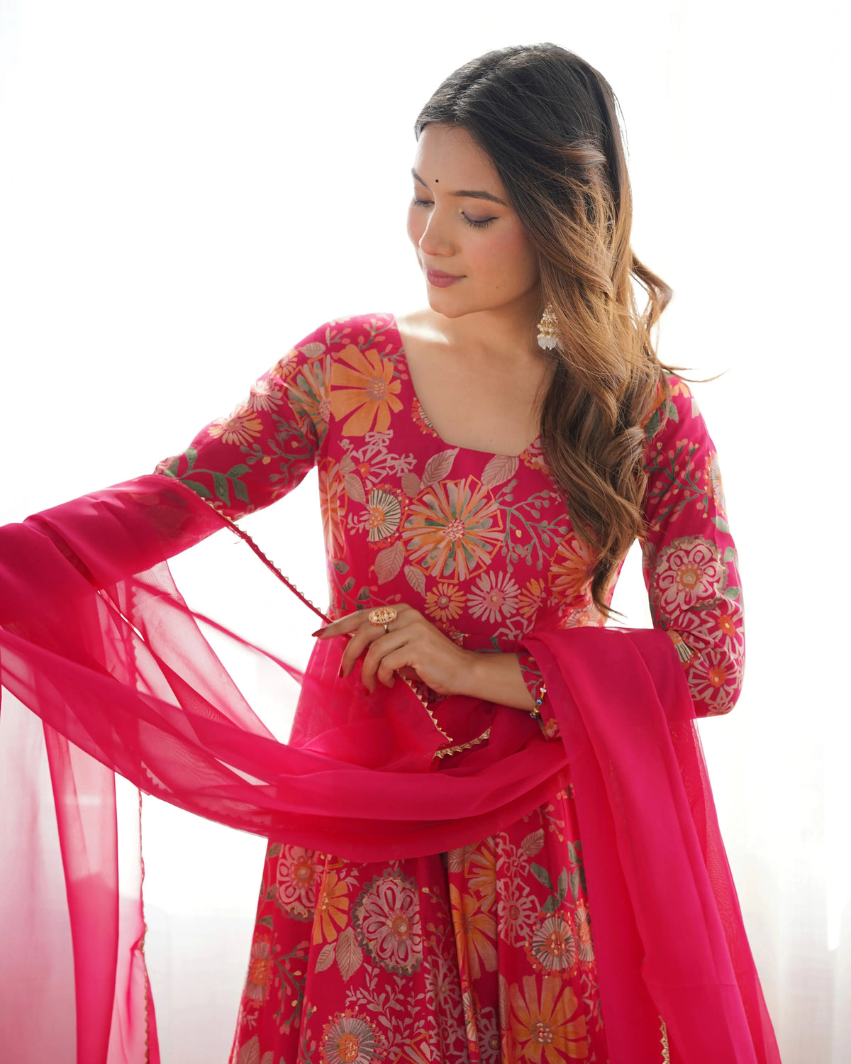Close-up of floral discharge print and round neckline on Dark Pink Suit
