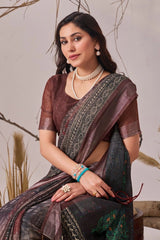 Woman wearing a traditional saree with a neutral background