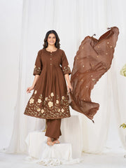 Women's embroidered brown kurta and pant set with delicate floral motifs and a coordinating sheer dupatta for timeless elegance.