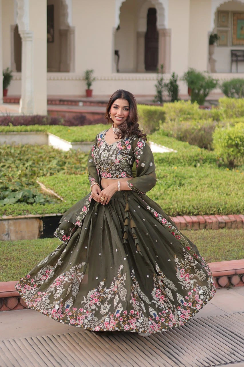 Woman in a floral dress standing in a garden setting