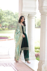 Designer navy velvet kurta set with ornate embroidery and a sheer dupatta, perfect for weddings and festive occasions.