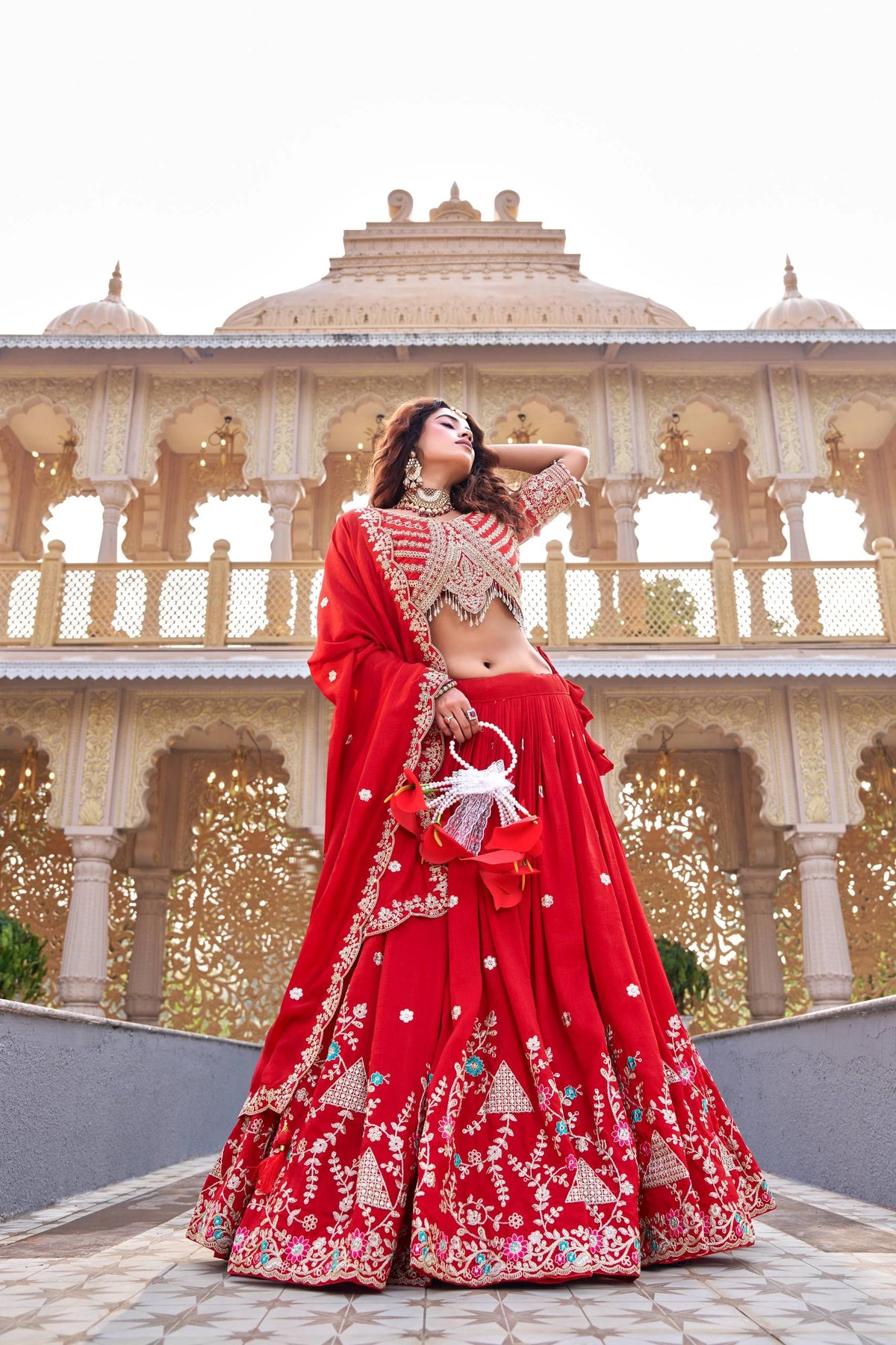 Elegant handcrafted pure Vichitra lehenga in dark pastel red featuring sequins embellishment