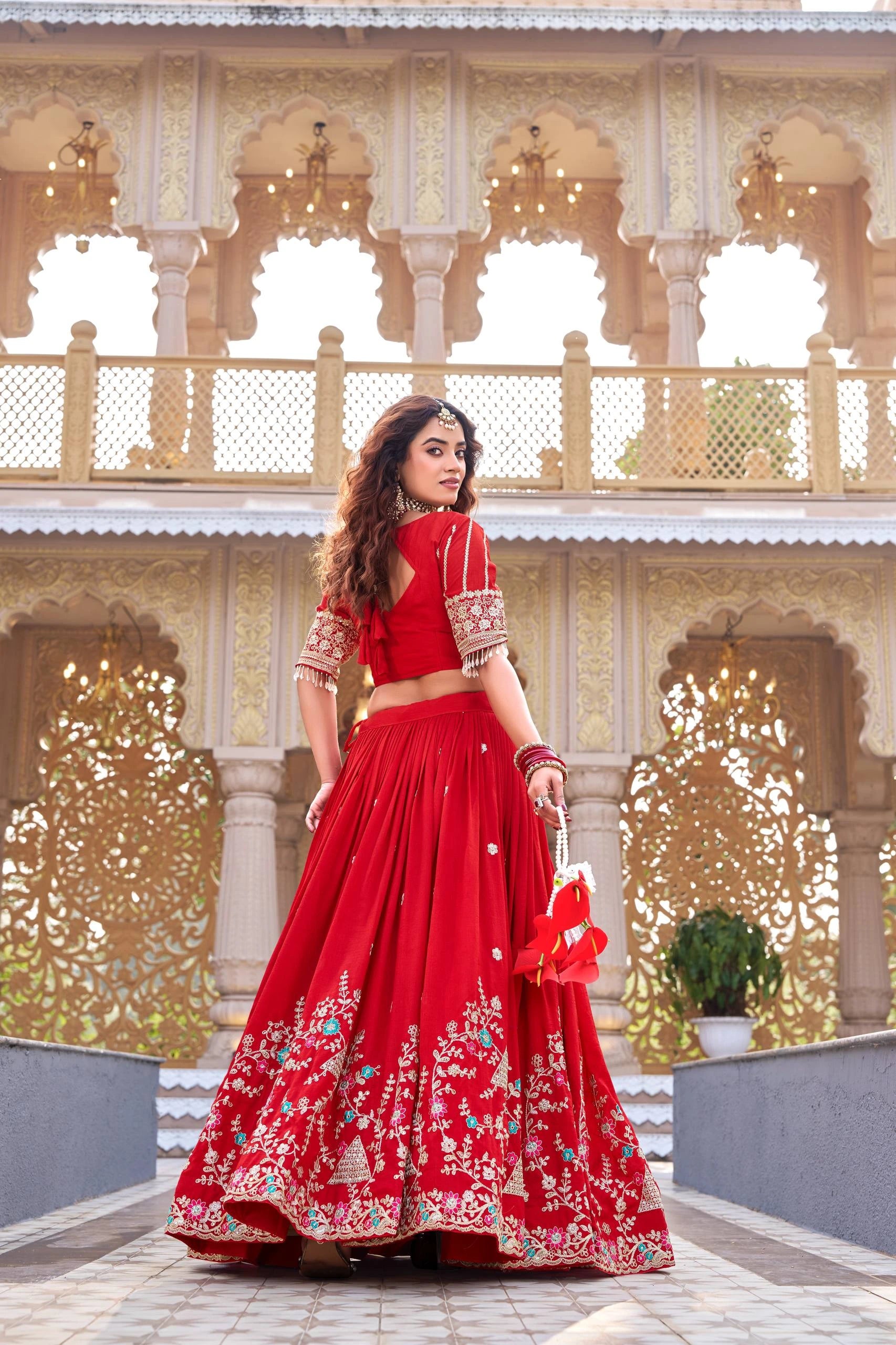 Detailed product listing of dark pastel red sequins embroidered lehenga from Kalyanja Fashion