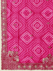 Pink fabric with white diamond pattern and decorative border