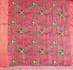 Pink fabric with green and gold floral patterns