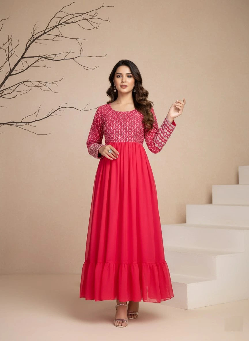 Woman wearing a red dress with intricate patterns on a beige background