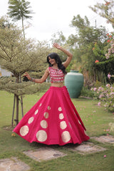 Luxurious full-length lehenga showcases premium quality fabric with striking oversized golden polka dot detailing.
