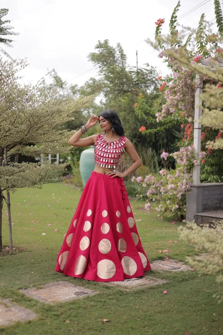 Sleeveless embellished blouse with intricate mirror work creates a stunning festive and celebration-ready appearance.