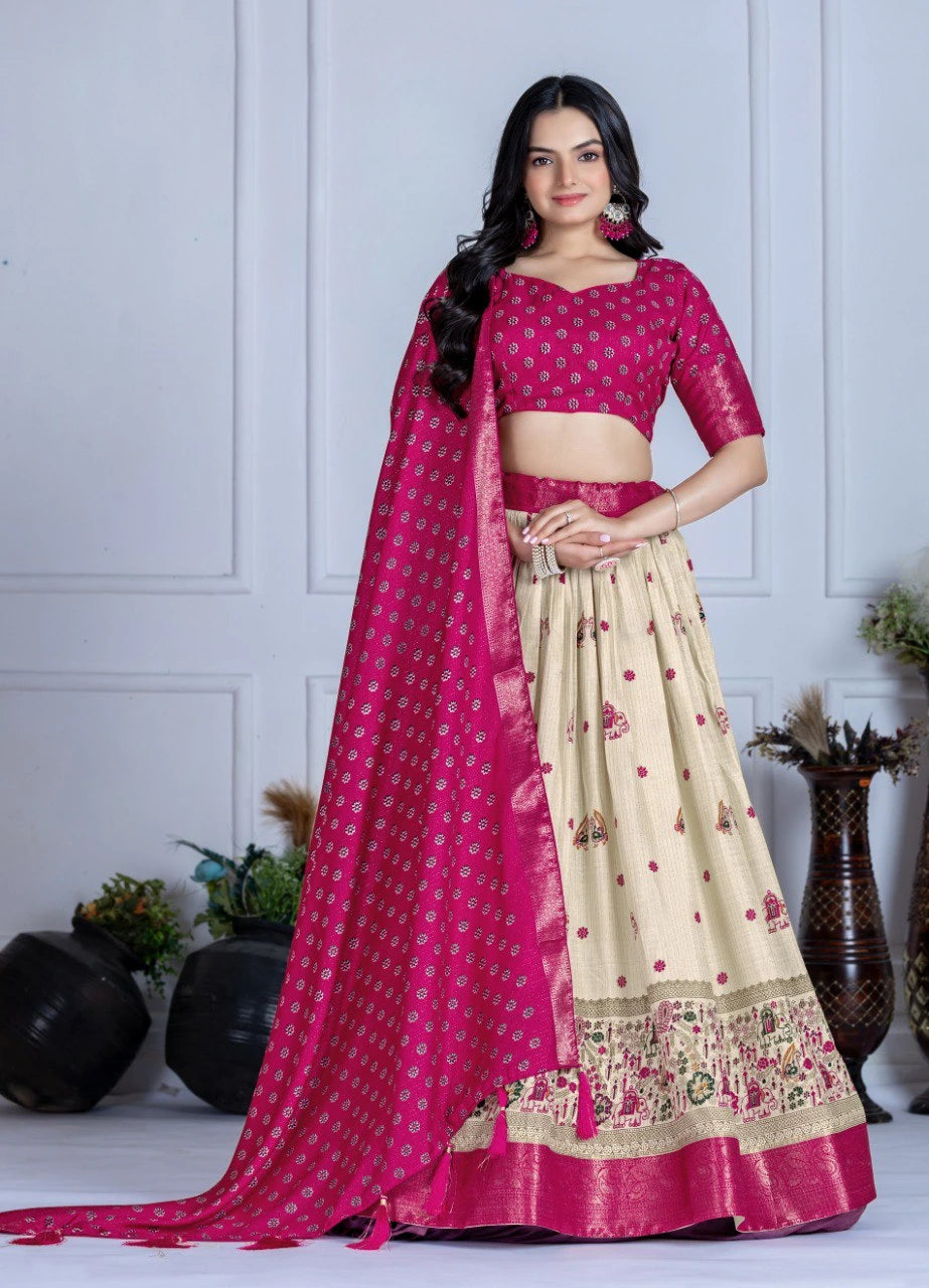 Woman wearing a pink and beige saree with a white background