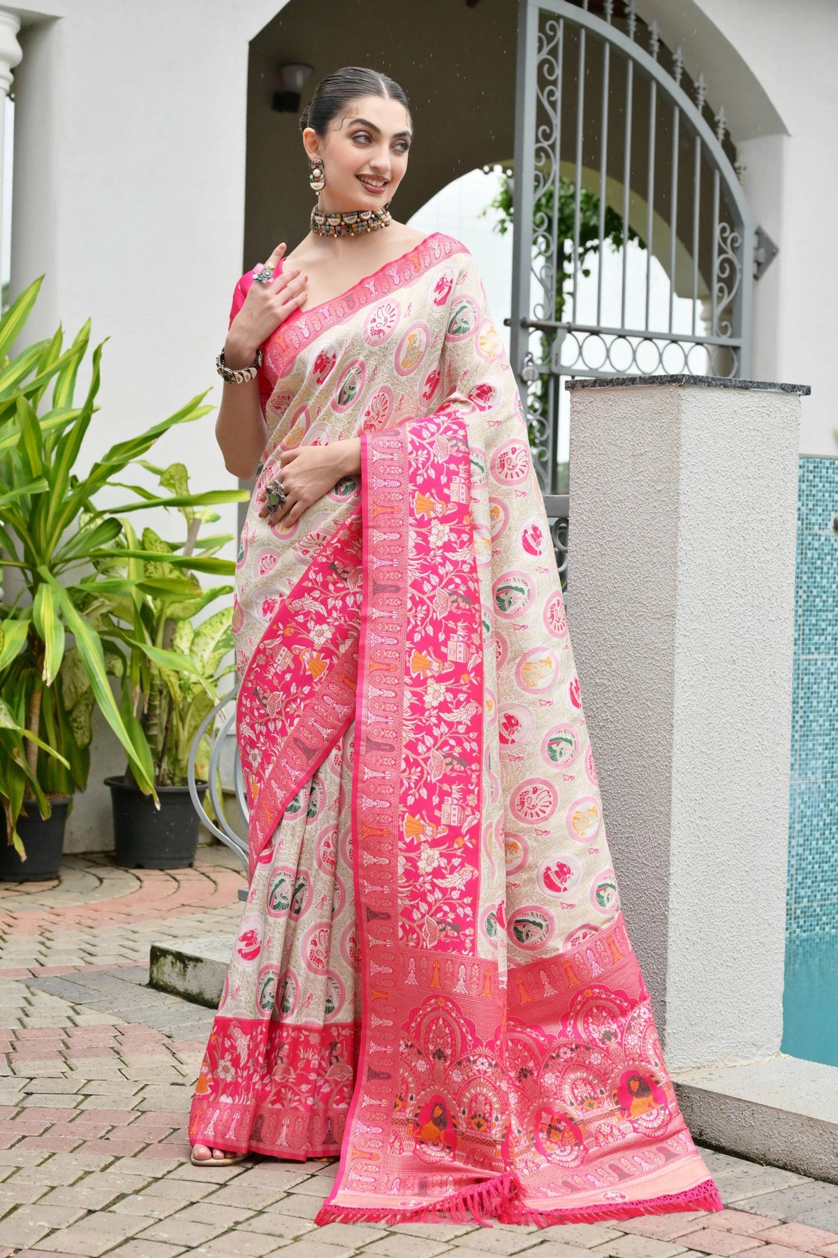 Elegant soft Banarasi silk saree in rich dark pink shade featuring intricate zari border and pallu.