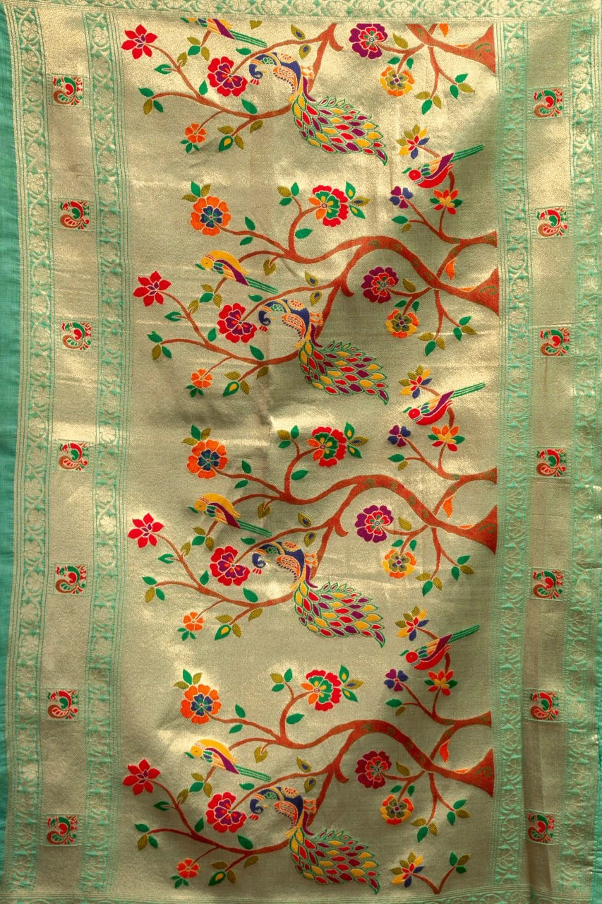 Decorative fabric with floral and bird embroidery on a beige background