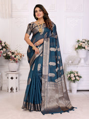 Woman wearing a blue saree with a white background