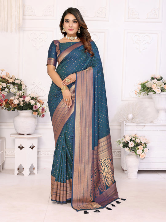 Woman wearing a blue saree with a white background