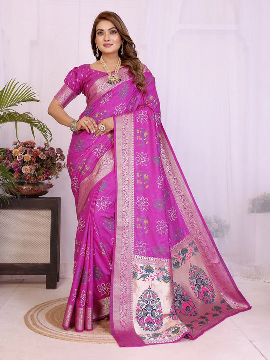 Woman wearing a pink saree with a white background