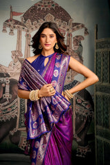 Woman in a purple saree with a decorative background