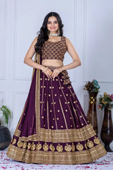Woman wearing a traditional purple and gold lehenga with a white background