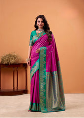 Woman wearing a pink and green saree with a matching blouse against an orange background