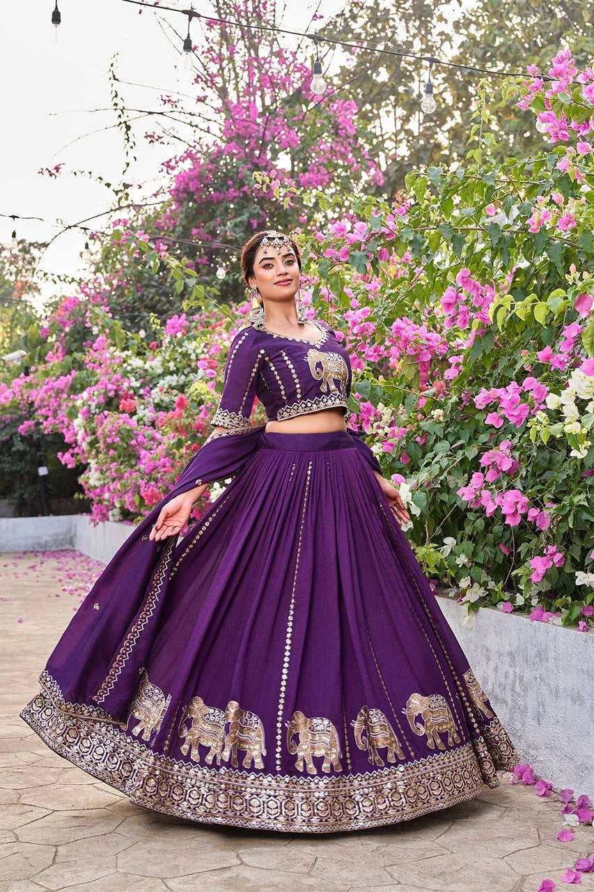 Luxurious deep purple Pure Fendy lehenga folded neatly, showcasing heavy embroidery and sequins work.